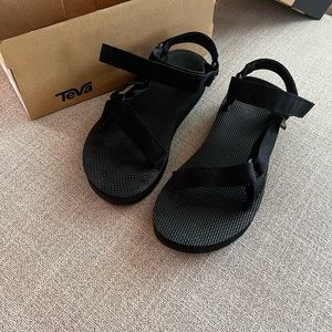 Women’s size 8 Teva sandals. Worn once like new with box